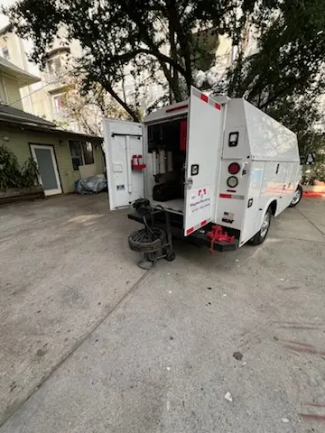 Magnet Plumbing service vehicle on-site for Slab Leak Repair in Kings Point Condominiums